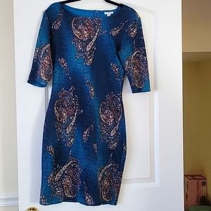 Olivia Matthew's teal paisley dress